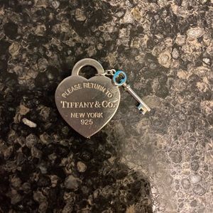 Tiffany and Co ❤️ & 🔑 pendant only. No chain.